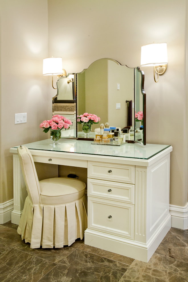 makeup table with sconces in the interior
