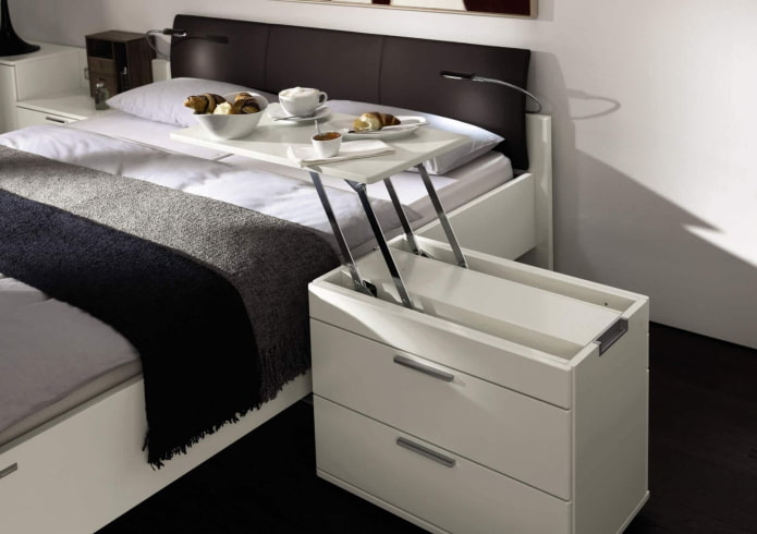 pull-out table in the interior of the bedroom