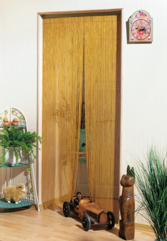 wooden curtains on the door in the interior