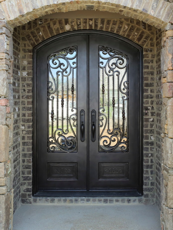front door with wrought iron and glass