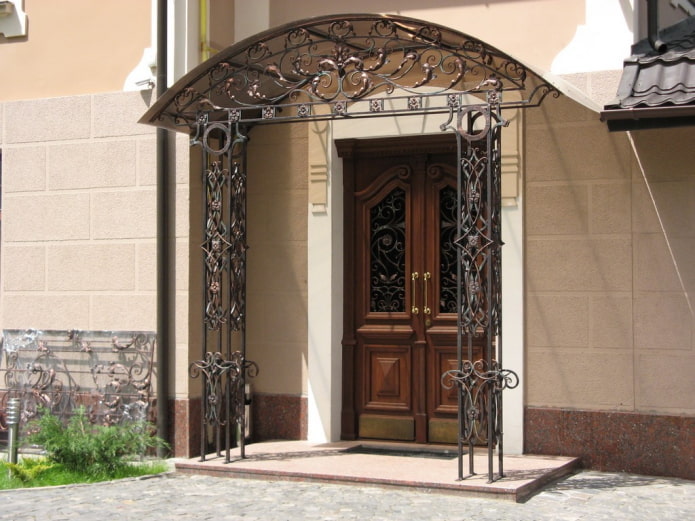 porch with a wrought-iron canopy