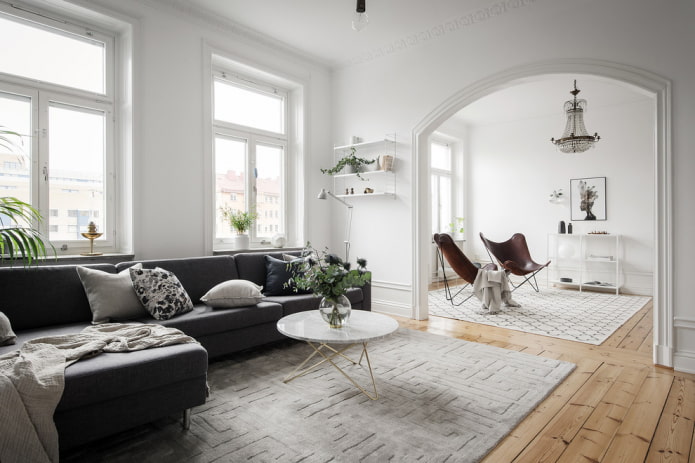 Scandinavian style living room with arch