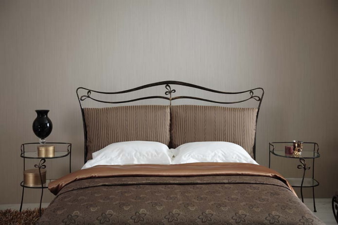 bed with a soft headboard in the interior