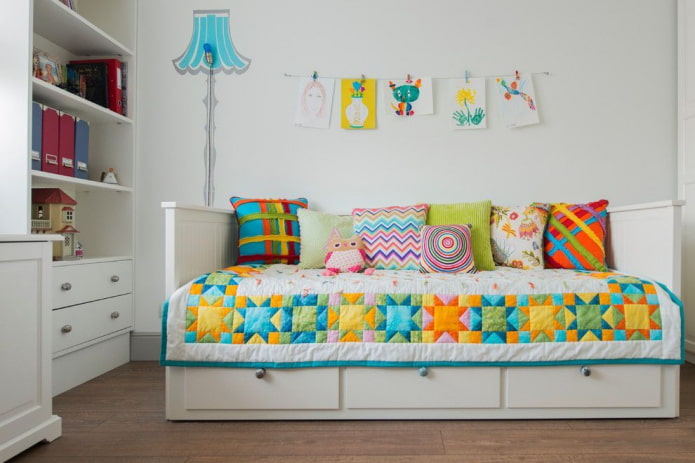 children's bed with a bedspread in the interior