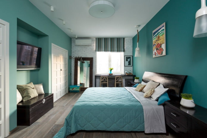 bed with turquoise bedspread in the bedroom