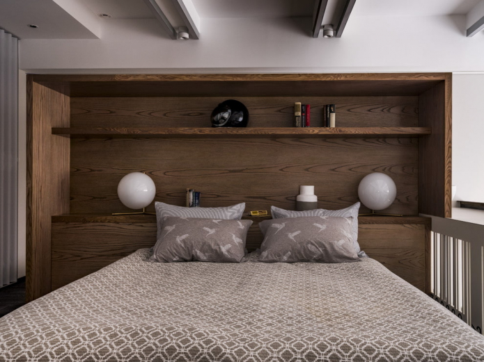 double model with shelves at the headboard in the interior