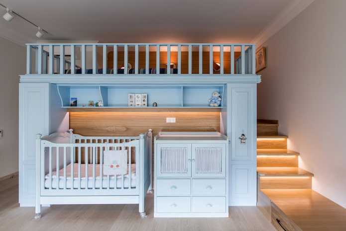 bed with changing table in the nursery