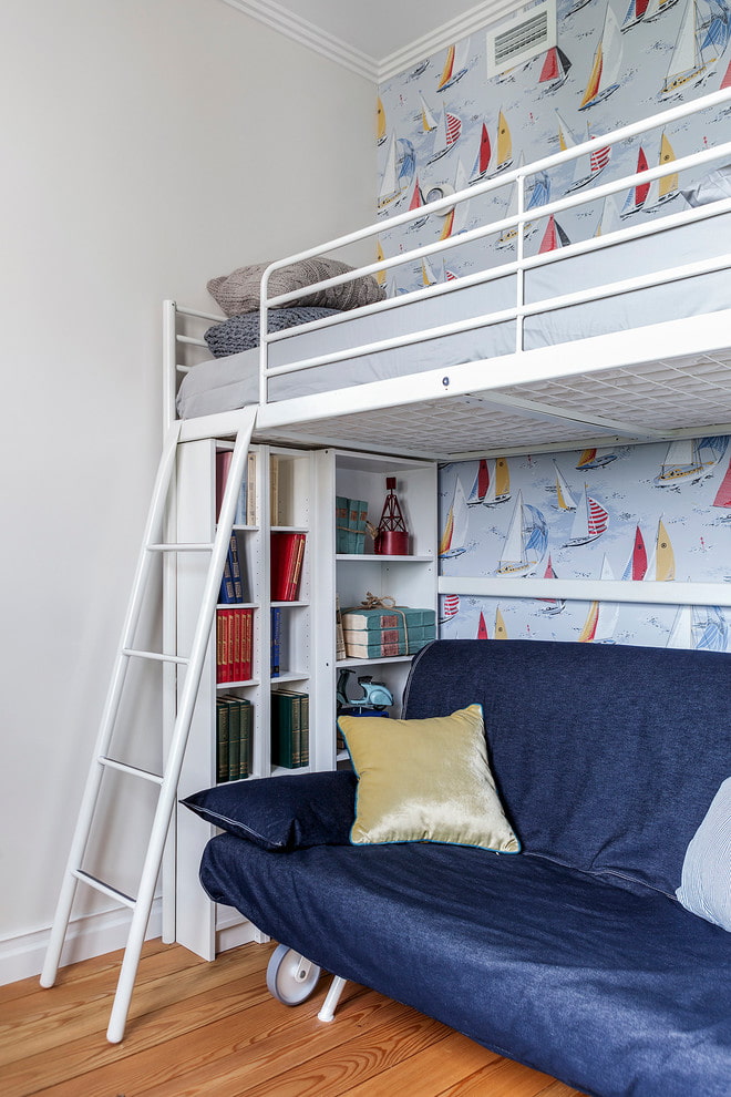loft bed with stairs in the nursery in a nautical style