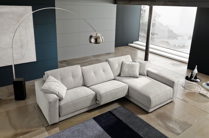 natitiklop na sofa sa istilo ng minimalism