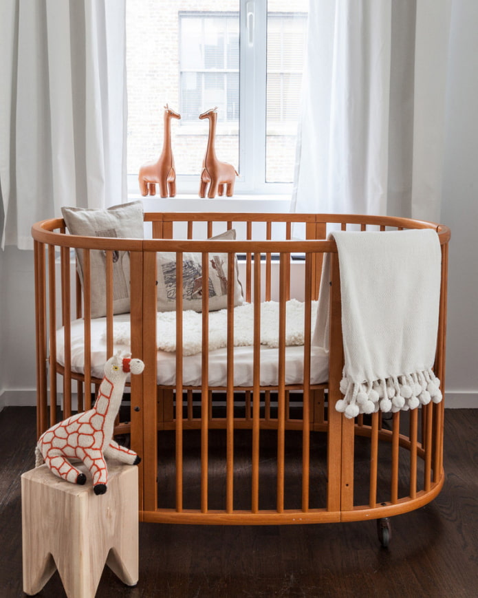 oval bed for baby in the interior