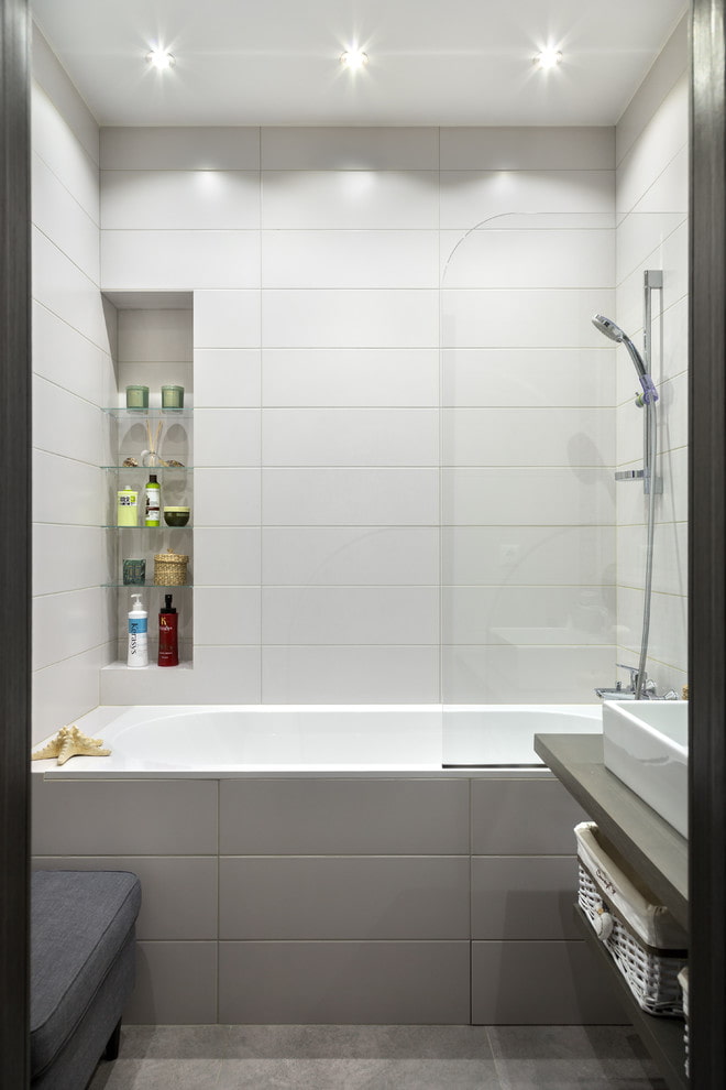 gray and white tiled finish in the bathroom