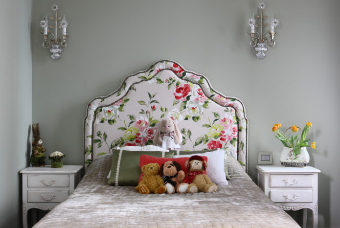 children's bed with a soft headboard