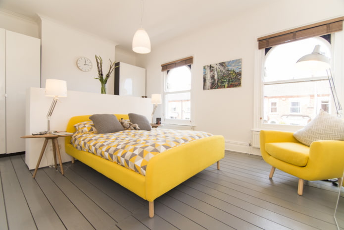 yellow bed in the interior of the bedroom