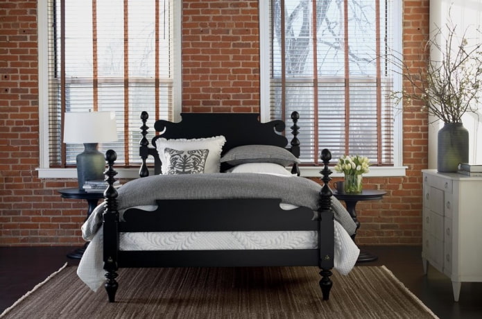 black bed in the interior of the bedroom