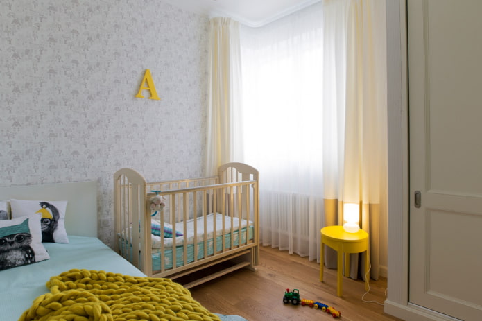 baby cot in the interior of the bedroom