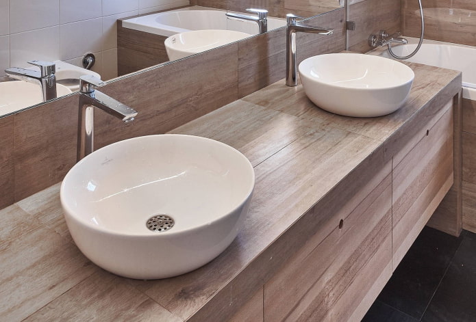 countertop with wood-effect tiles in the bathroom interior