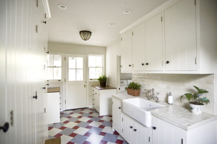 White kitchen with colored floor