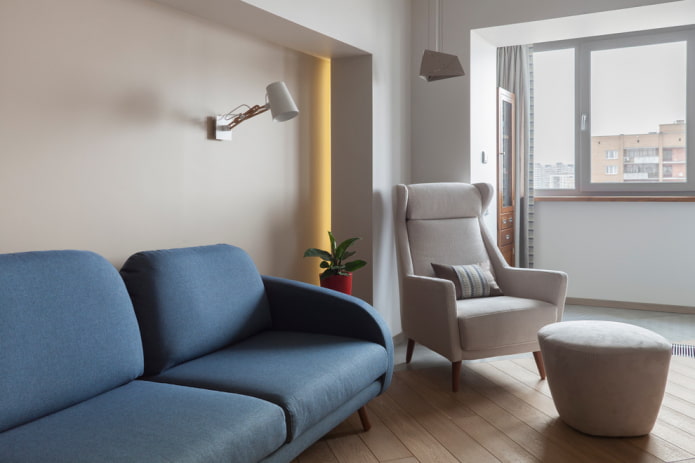 blue sofas combined with an armchair
