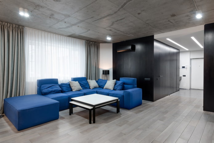 blue modular sofa in the interior