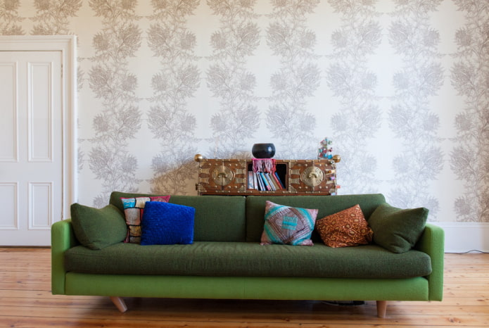 sofa with green fabric upholstery in the interior