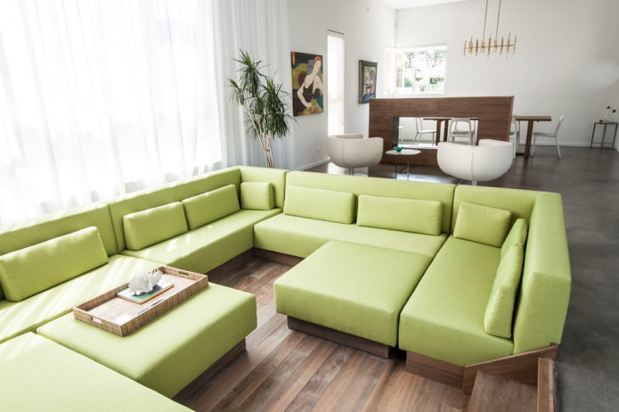 green modular sofa in the interior