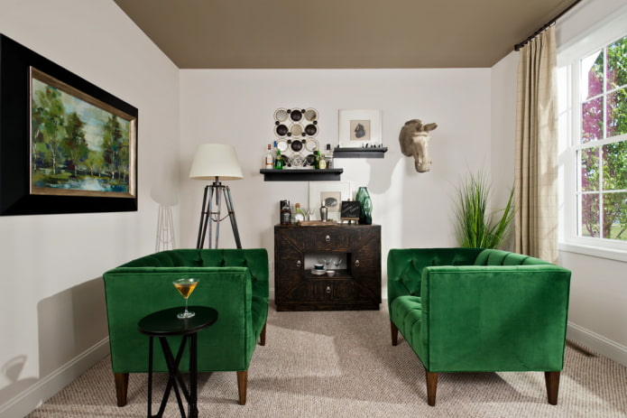 green sofas on legs in the interior
