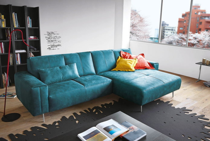 sofa with turquoise leather upholstery in the interior