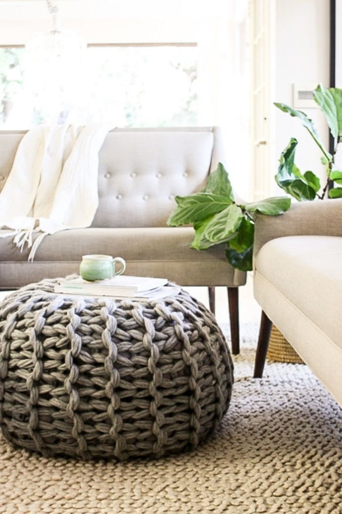 knitted pouf in the living room interior
