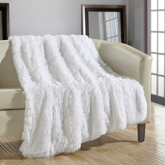 fluffy cover for the sofa in the interior