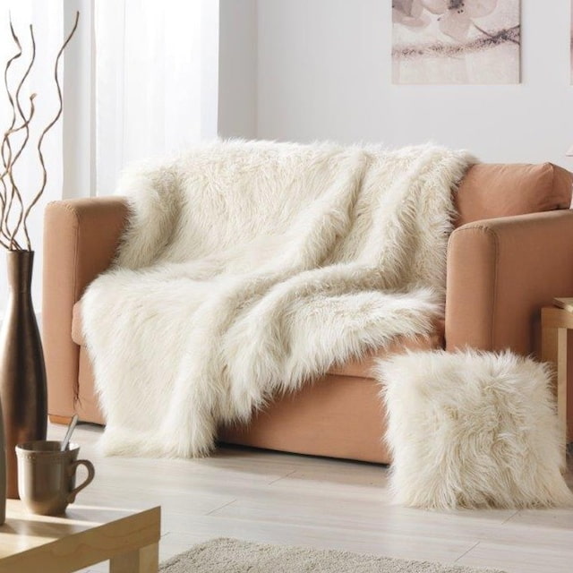 fluffy cover for the sofa in the interior