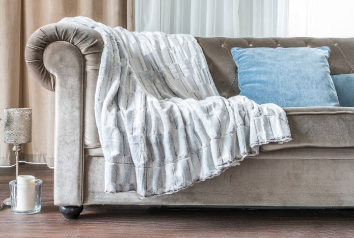 white blanket for the sofa in the interior