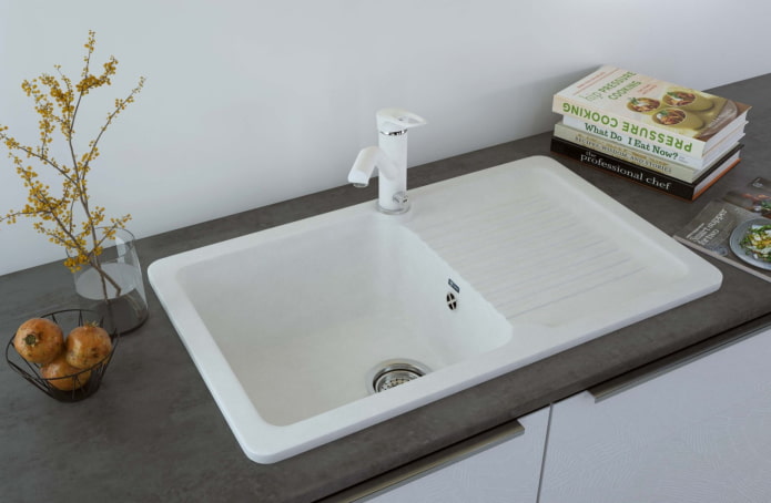 white sink made of artificial stone in the interior