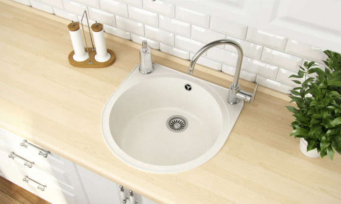 white sink made of artificial stone in the interior