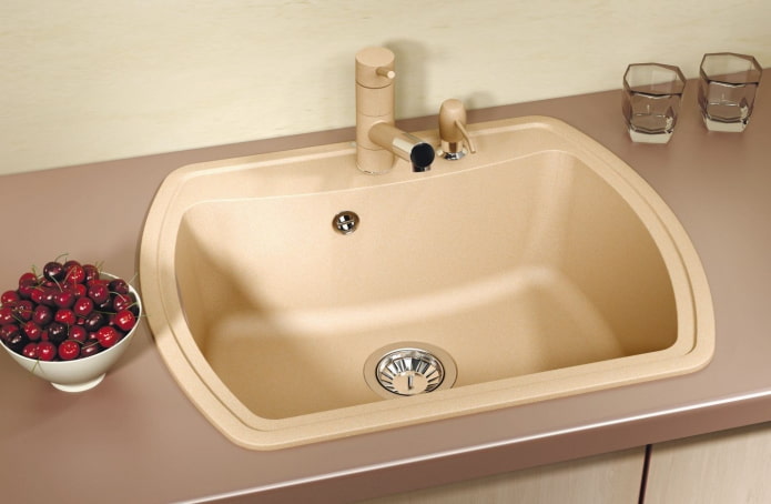 beige sink made of artificial stone in the interior