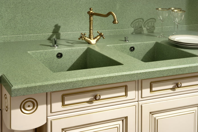 green sink made of artificial stone in the interior