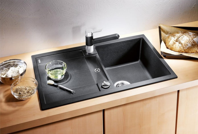 black sink made of artificial stone in the interior