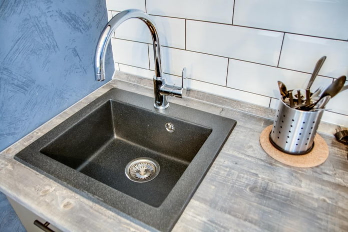 sink made of artificial stone in the interior of the kitchen
