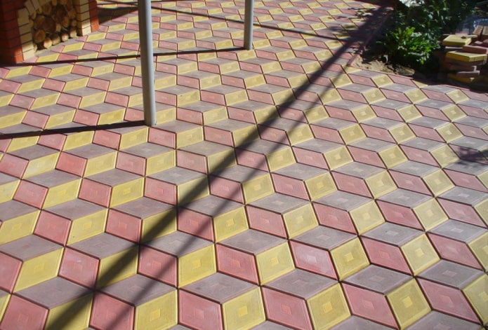 the layout of curly tiles for the sidewalk