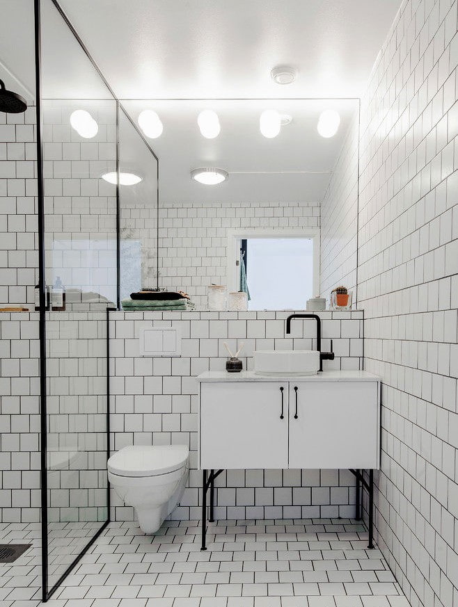 white tiles in the bathroom interior