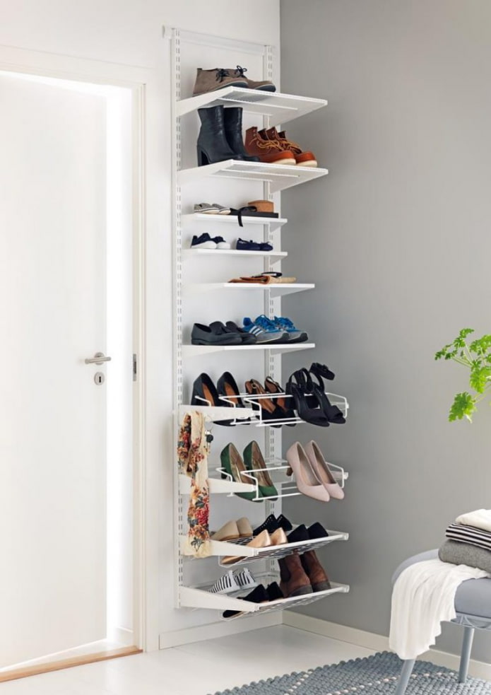 wall shoe rack in the interior of the hallway