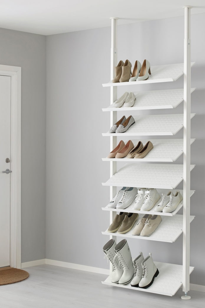 shoe rack to the ceiling in the interior of the hallway