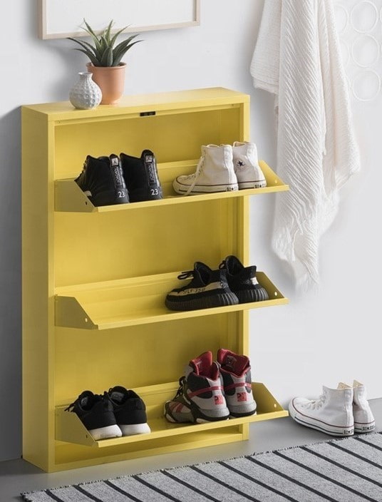 yellow shoe rack in the interior of the hallway