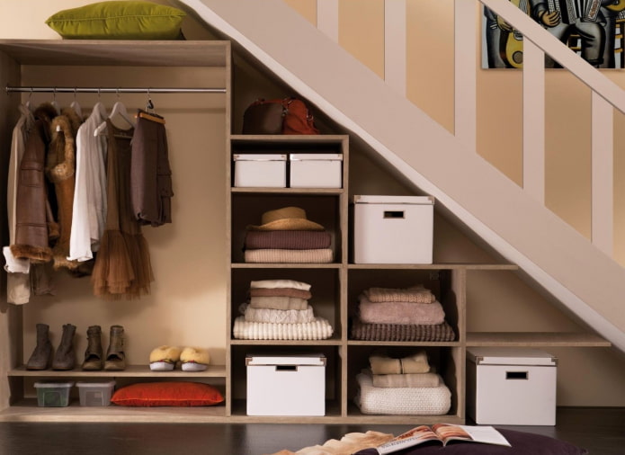 built-in open wardrobe under the flight of stairs
