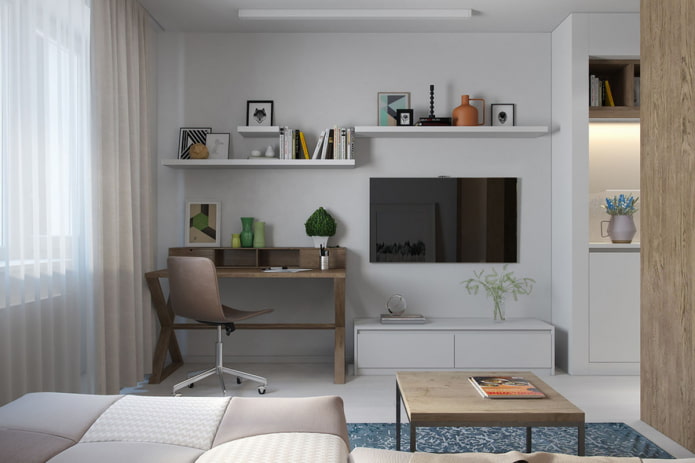 design of the working area in the interior of a studio apartment