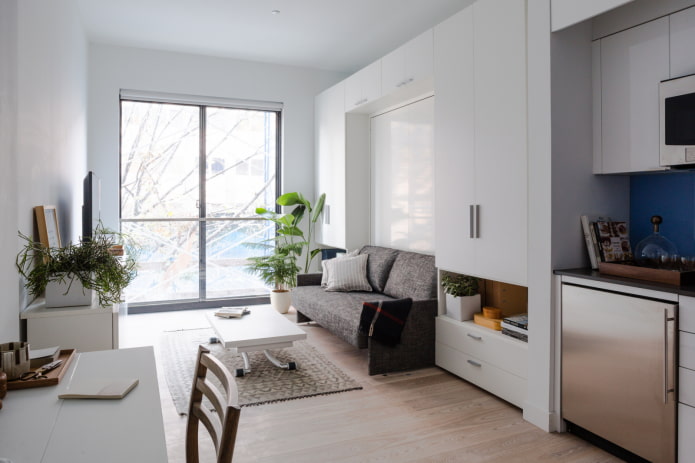 interior of a studio apartment with one window