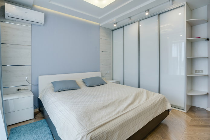 wardrobe in a white shade in the interior of the bedroom