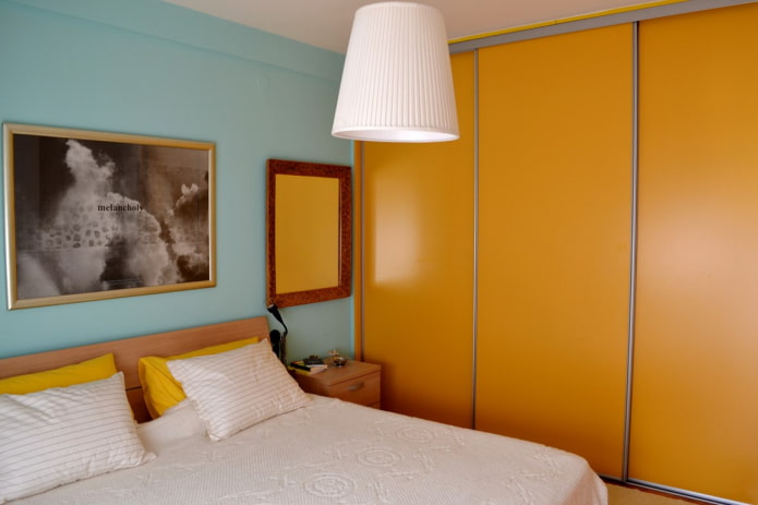 orange-colored wardrobe in the bedroom interior