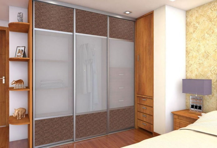 sliding wardrobe with rattan facade trim in the bedroom