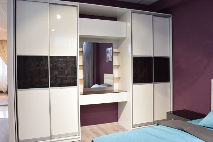 wardrobe with dressing table in the interior of the bedroom