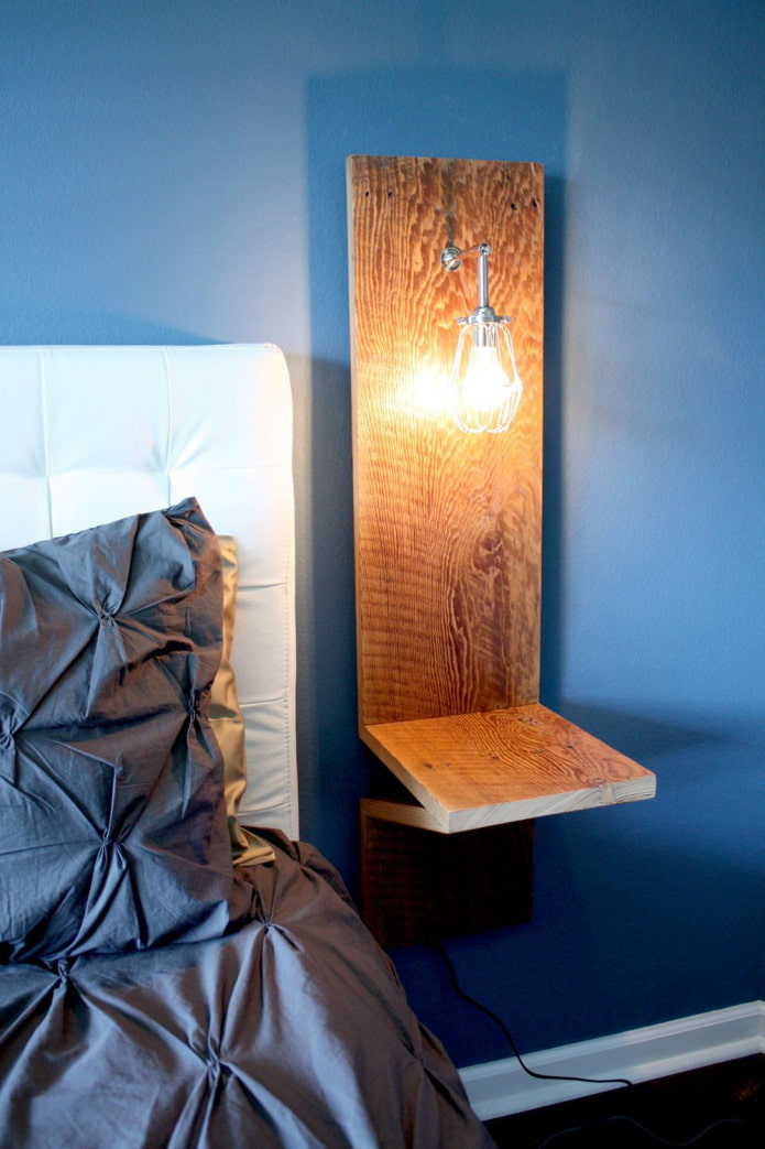 Wooden lamp by the bed